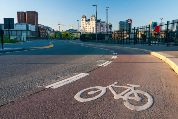 Morning traffic queue contrasted with clear bike lane in urban Norway